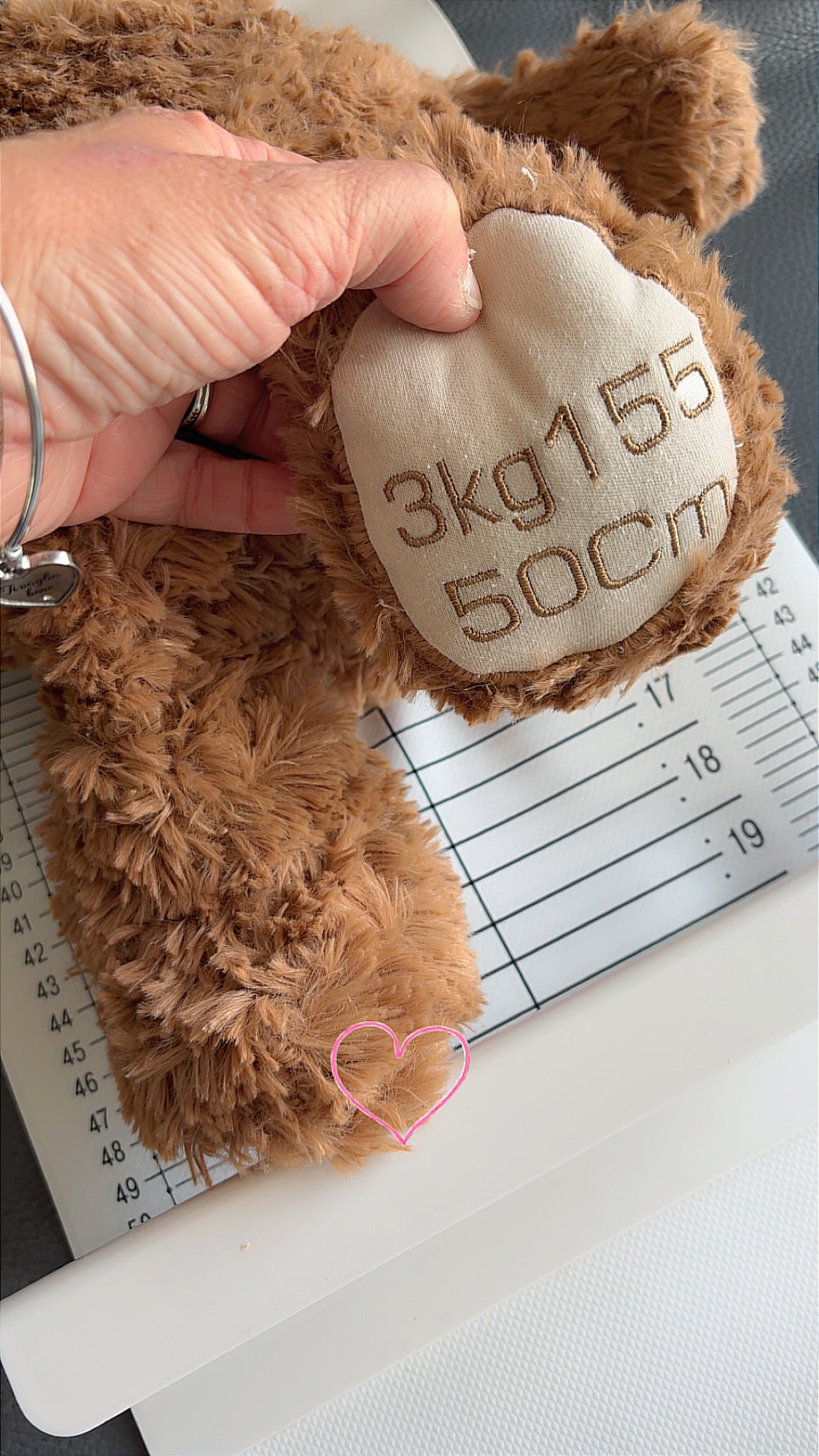 Peluche au poids et à la taille de bébé